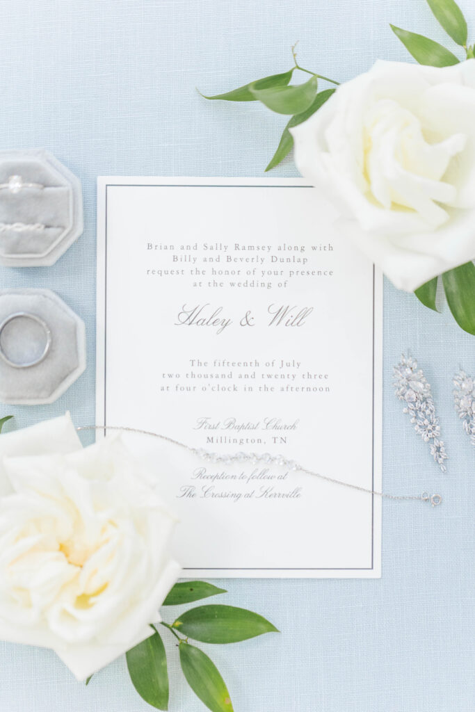 Bright and timeless edit of invitation suite, jewelry, and florals.