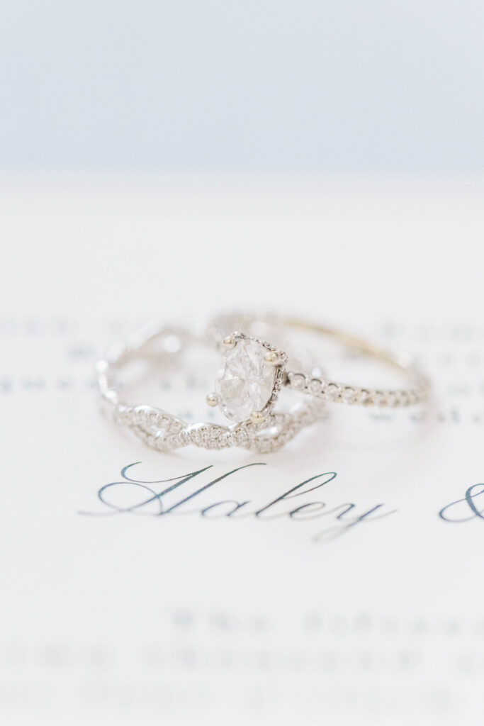 Bright and timeless edit of brides engagement ring and wedding band