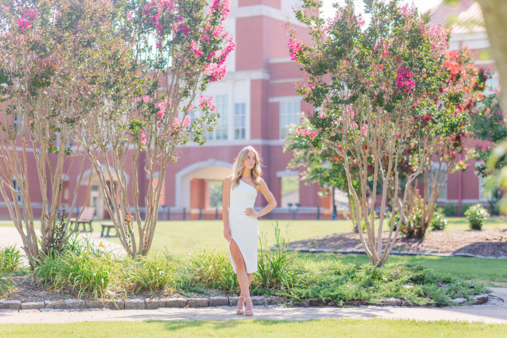 Client poses for a senior session at Murray State University
